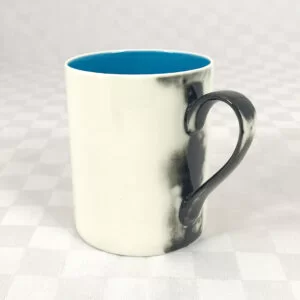 blue and white ceramic mug