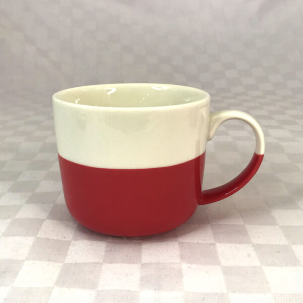 cream and red ceramic mug
